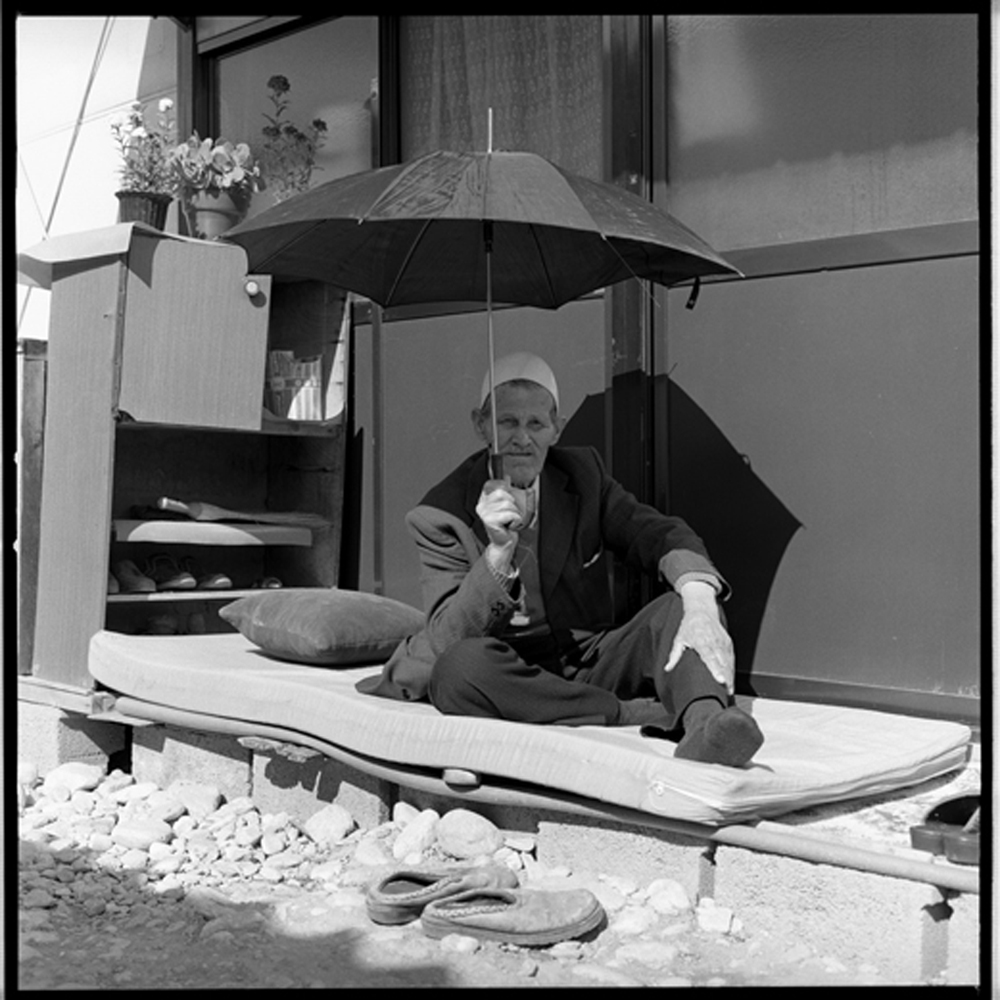 Charles A. Meyer: Man with Umbrella